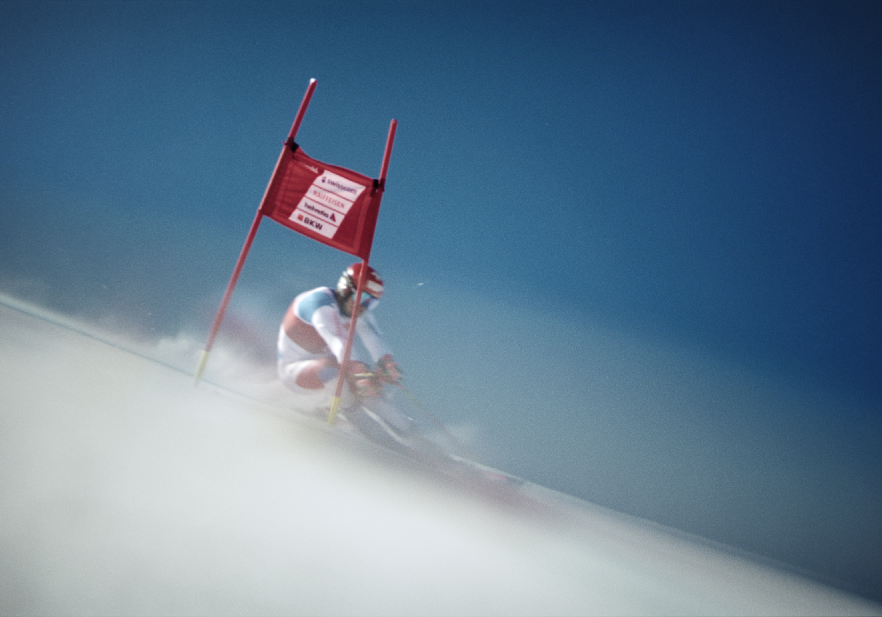 Skier racing through snow
